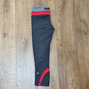 Lululemon Dark gray with coral accents size 4 crop pant leggings